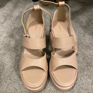 Never worn platform nude sandals.